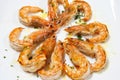 Delicious cooked prawn plate served with olive oil
