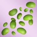 Delicious cooked soy beans flying on violet background. Edamame