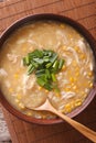 Delicious corn and chicken soup close up in a bowl. vertical top Royalty Free Stock Photo