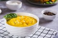 Delicious corn cream soup in a bowl on the table Royalty Free Stock Photo