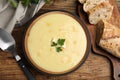 Delicious corn cream soup served on table, flat lay Royalty Free Stock Photo