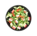 Delicious crab stick salad in black bowl isolated on white, top view