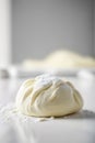 Delicious cream cheese pastry dough on a white table, copy space