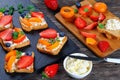 Delicious cream cheese toasts with fruits Royalty Free Stock Photo