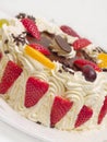 Delicious cream layer cake with strawberries