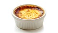 Delicious creme brulee in ceramic ramekin isolated on white Royalty Free Stock Photo