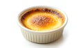 Delicious creme brulee in ceramic ramekin isolated on white Royalty Free Stock Photo