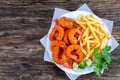 Breaded Fried Shrimps with french fries Royalty Free Stock Photo