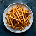 Delicious crispy french fries seasoned with salt and spices