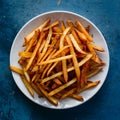 Delicious crispy french fries seasoned with salt and spices