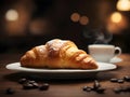 A delicious croissant with a cup of coffee