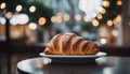 Delicious croissant. Fresh croissant on a cafe table. AI generated