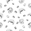 Delicious croissants and coffee cups for breakfast draw a seamless hand-drawn pattern.Pastries for breakfast.Cozy stock