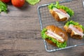 Delicious croissants sandwichs with fresh Ham, cheese, tomato, cucumber, lettuce and Sub sandwich with fresh salad, Ham , cheese. Royalty Free Stock Photo