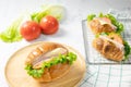 Delicious croissants sandwichs and Sub sandwich served on sieve. Royalty Free Stock Photo