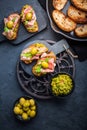 Delicious crostini with avocado spread and serrano or prosciutto ham Royalty Free Stock Photo