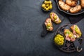 Delicious crostini with avocado spread and serrano or prosciutto ham Royalty Free Stock Photo