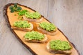 Delicious crostini with puree of raw beans and peas Royalty Free Stock Photo