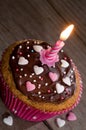 Delicious cupcake with candle and copyspace