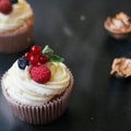 Delicious cupcakes with berries Royalty Free Stock Photo