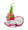 Delicious cut and whole dragon fruits pitahaya on background