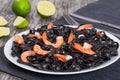 Delicious Cuttlefish ink black noodles with prawns Royalty Free Stock Photo