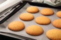 Delicious Danish butter cookies on baking tray, closeup