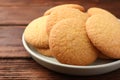 Delicious Danish butter cookies on wooden table