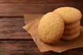 Delicious Danish butter cookies on wooden table, closeup. Space for text Royalty Free Stock Photo