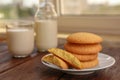 Delicious Danish butter cookies on wooden table, closeup. Space for text