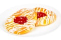 Delicious danish pastry on a plate, on white background Royalty Free Stock Photo