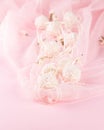Delicious delicate candies on a pink viel