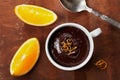 Delicious dessert from dark chocolate mousse with orange slice decorated citrus peel Royalty Free Stock Photo