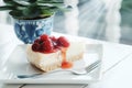 Delicious with dessert a piece of cherry cheesecake on white tone wooden table Royalty Free Stock Photo