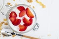 Delicious dessert of strawberries, yogurt and sugar-free cereals