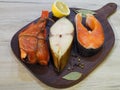 Delicious different fish on a wooden stand