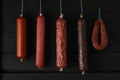 Delicious different hanging sausages