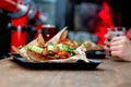 Delicious dinner in restaurant on a wooden table. Tasty food with beer in cafe or pub menu Royalty Free Stock Photo