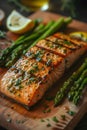 Grilled salmon and asparagus on a wooden cutting board Royalty Free Stock Photo