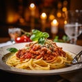 a delicious dish of homemade spaguetti bolognese on a plate on a table in an italian restaurant Royalty Free Stock Photo