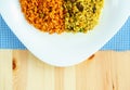 Delicious dish made of two kinds of rice on a white plate Royalty Free Stock Photo