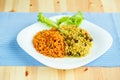 Delicious dish made of two kinds of rice on a white plate Royalty Free Stock Photo