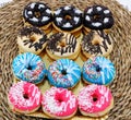 Delicious donuts with colorful chocolate