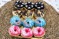 Delicious donuts with colorful chocolate