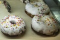 delicious doughnuts in many colors for dessert. Black and white sesame, bean on top of Chinese cake