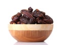 Delicious dried dates in wooden bowl