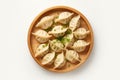 Delicious Dumplings Arranged Artfully On A White Plate
