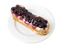 Delicious eclair with berry jam.