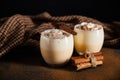 Delicious eggnog cocktail, cinnamon branches and