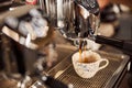 Delicious espresso made in the coffee house in modern machine